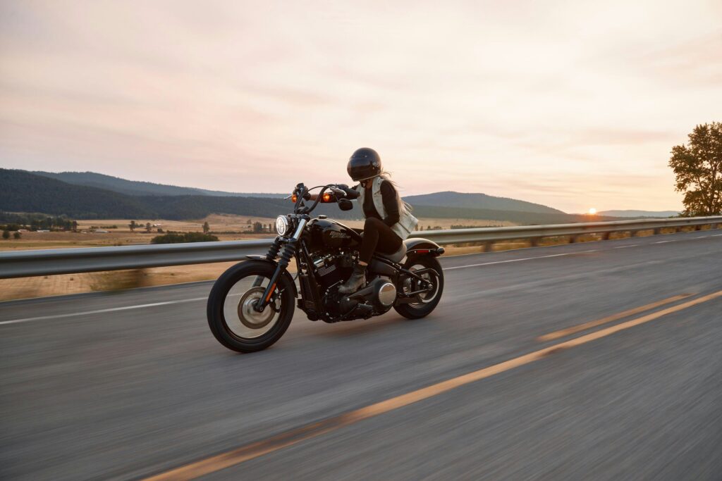 Motorcycle on the road, representing coverage options for different vehicle types